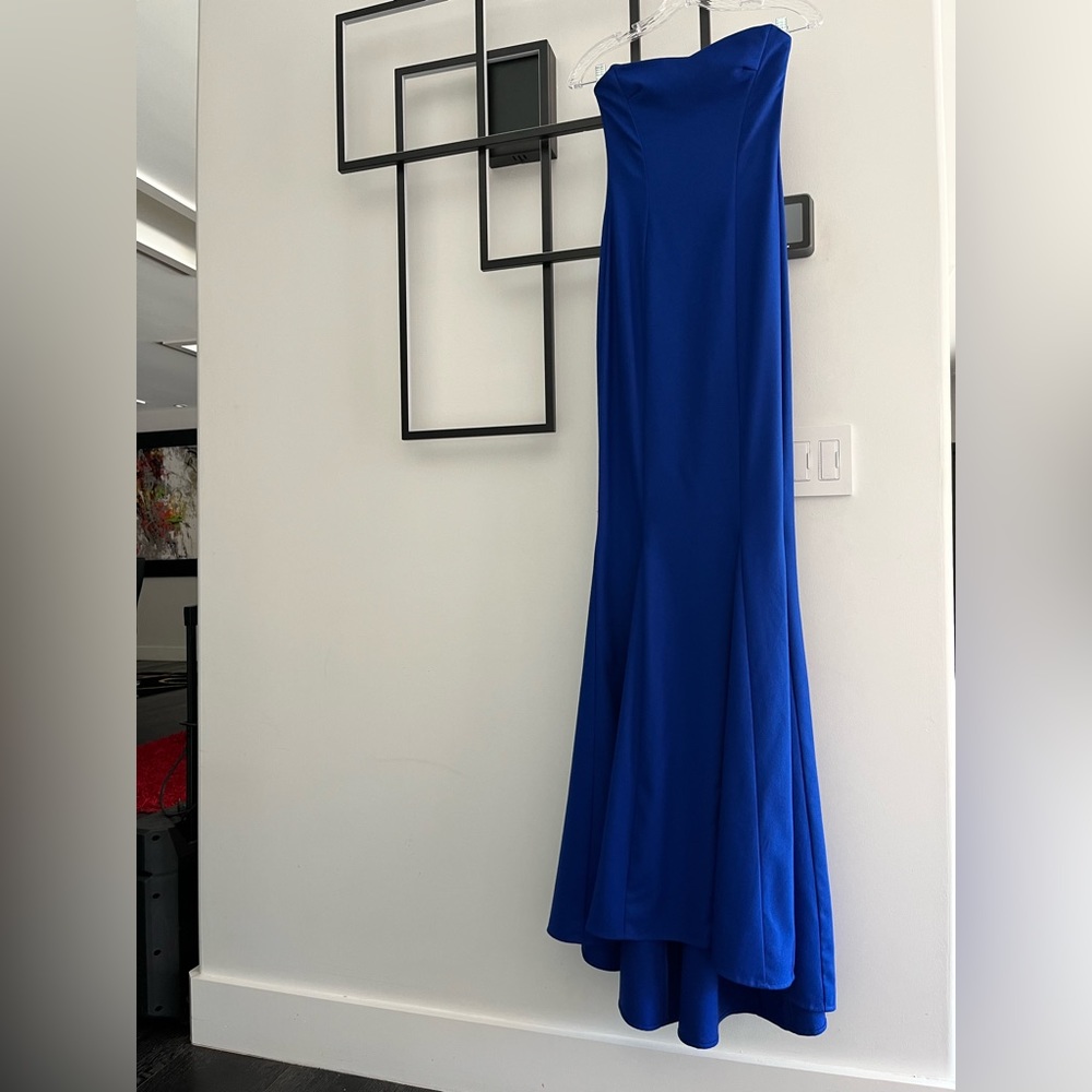 Evening dress with a long train.